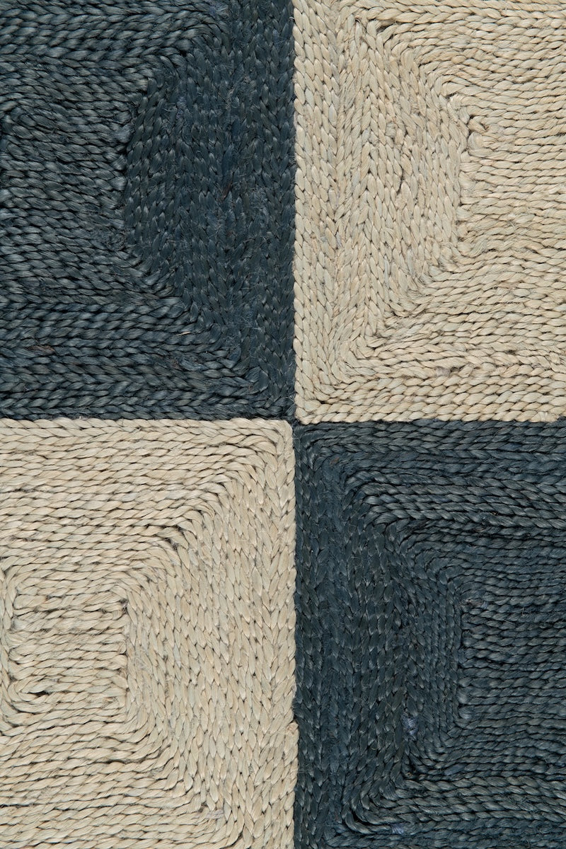 Handwoven jute rug sample in Navy and Sky Blue by Part & Parcel Goods
