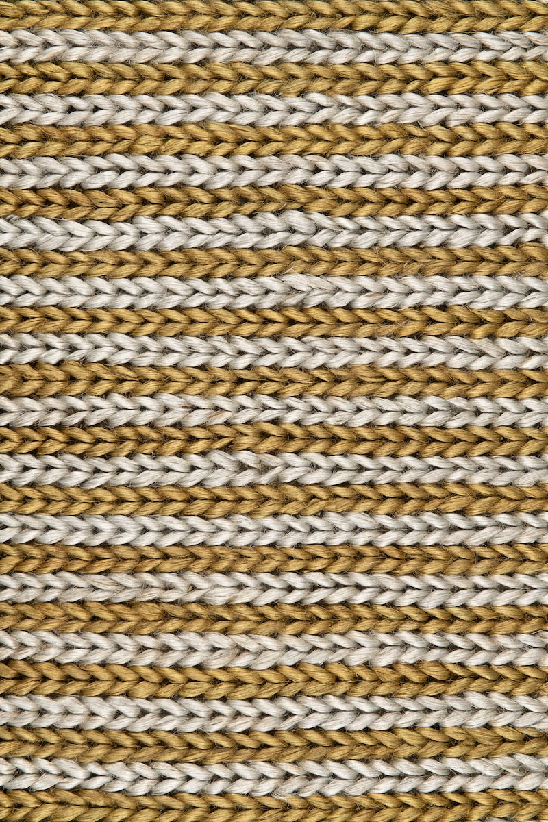 Handwoven jute rug in Olive and Sky Blue by Part & Parcel Goods