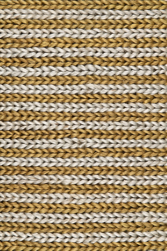 Handwoven jute rug in Olive and Sky Blue by Part & Parcel Goods