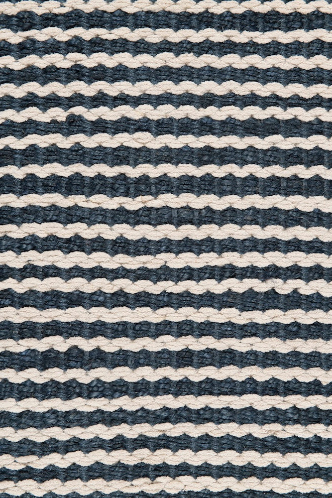 Handwoven hemp and chenille rug in Sapphire and Eggshell by Part & Parcel Goods