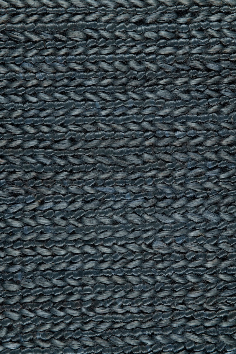 Handwoven jute rug in Navy by Part & Parcel Goods