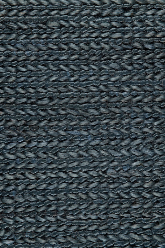 Handwoven jute rug in Navy by Part & Parcel Goods