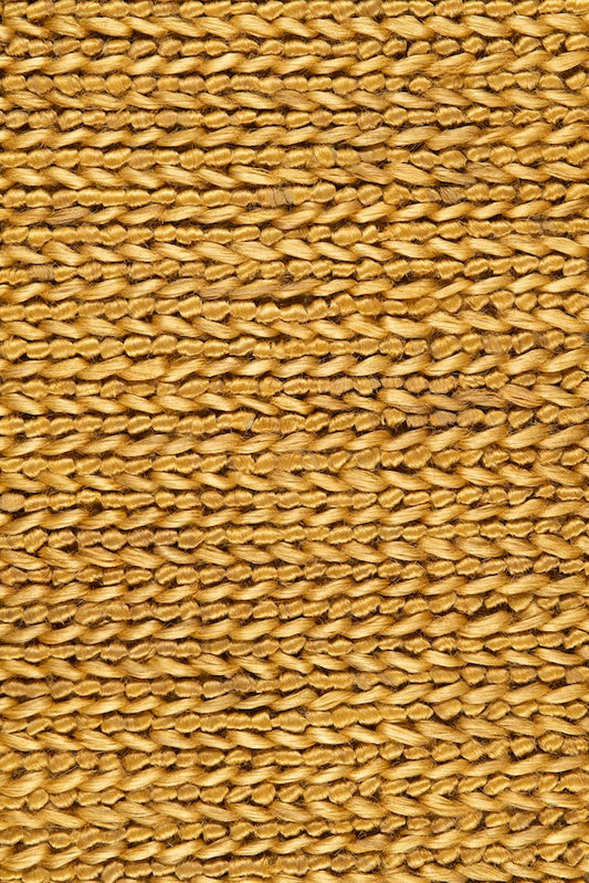 Handwoven jute rug in Mustard by Part & Parcel Goods