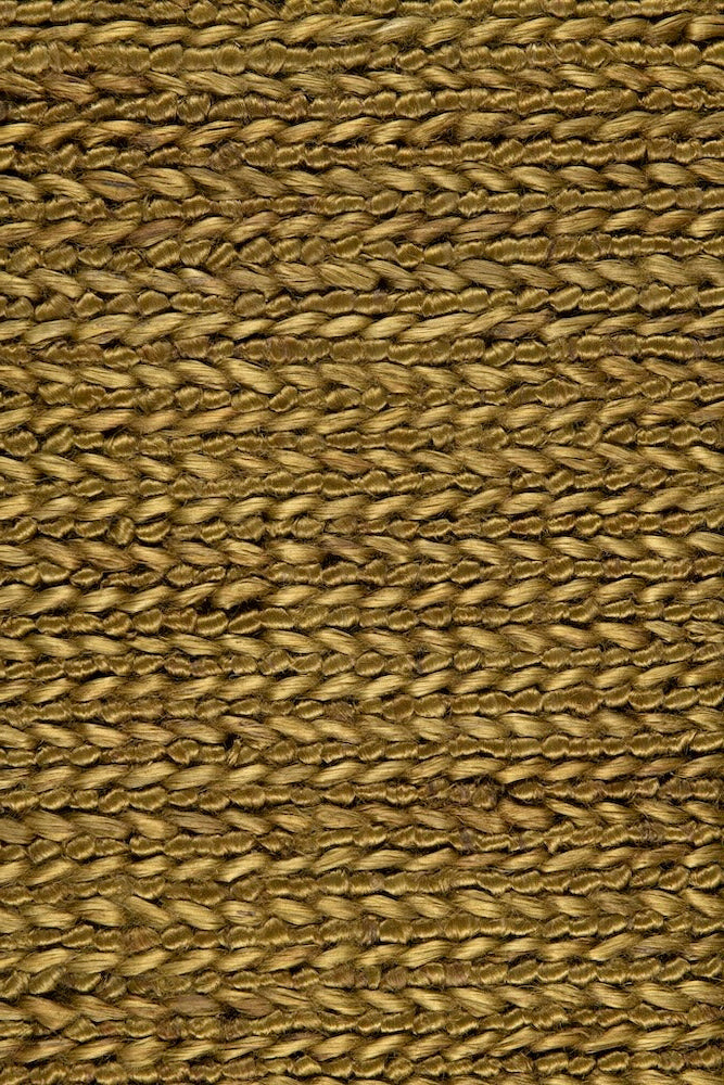 Handwoven jute rug in Olive by Part & Parcel Goods