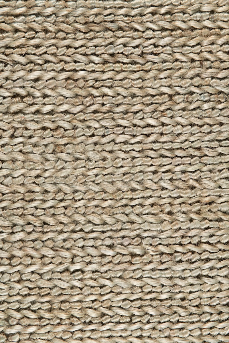 Handwoven jute rug in Sky Blue by Part & Parcel Goods