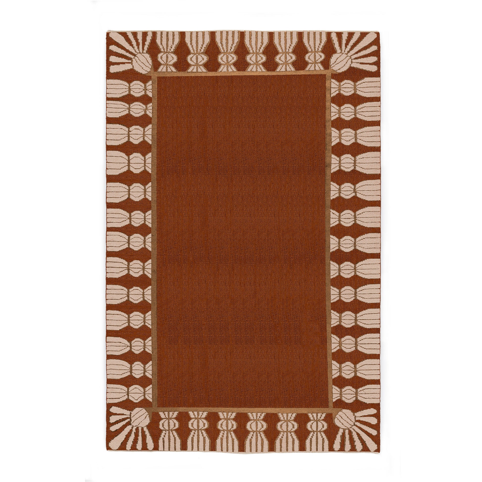 Performance indoor/outdoor Tassel Rug in terra cotta, muddy pink and tan