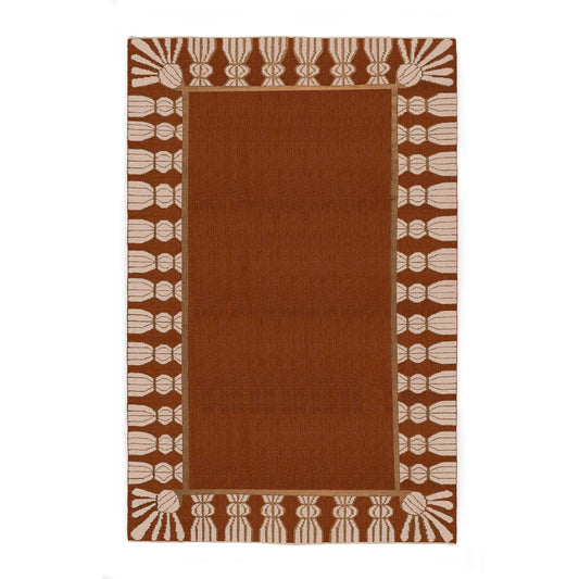 Performance indoor/outdoor Tassel Rug in terra cotta, muddy pink and tan